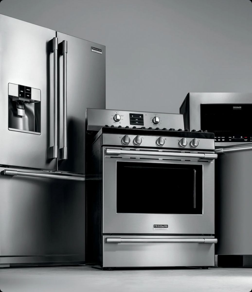 Esquire Appliance Repair technician servicing a Frigidaire appliance in Orange County