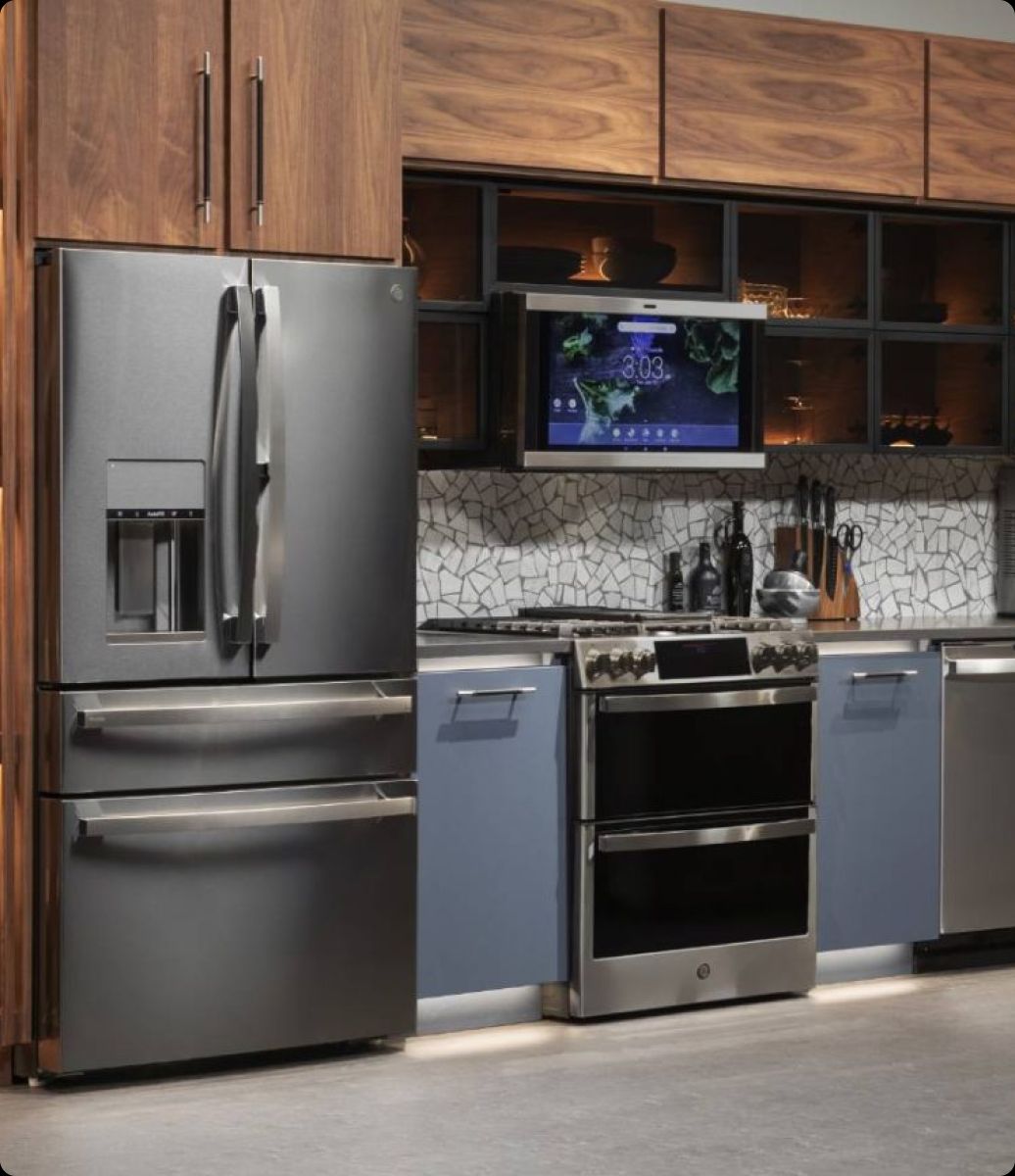 Esquire Appliance Repair technician servicing a GE appliance in Orange County