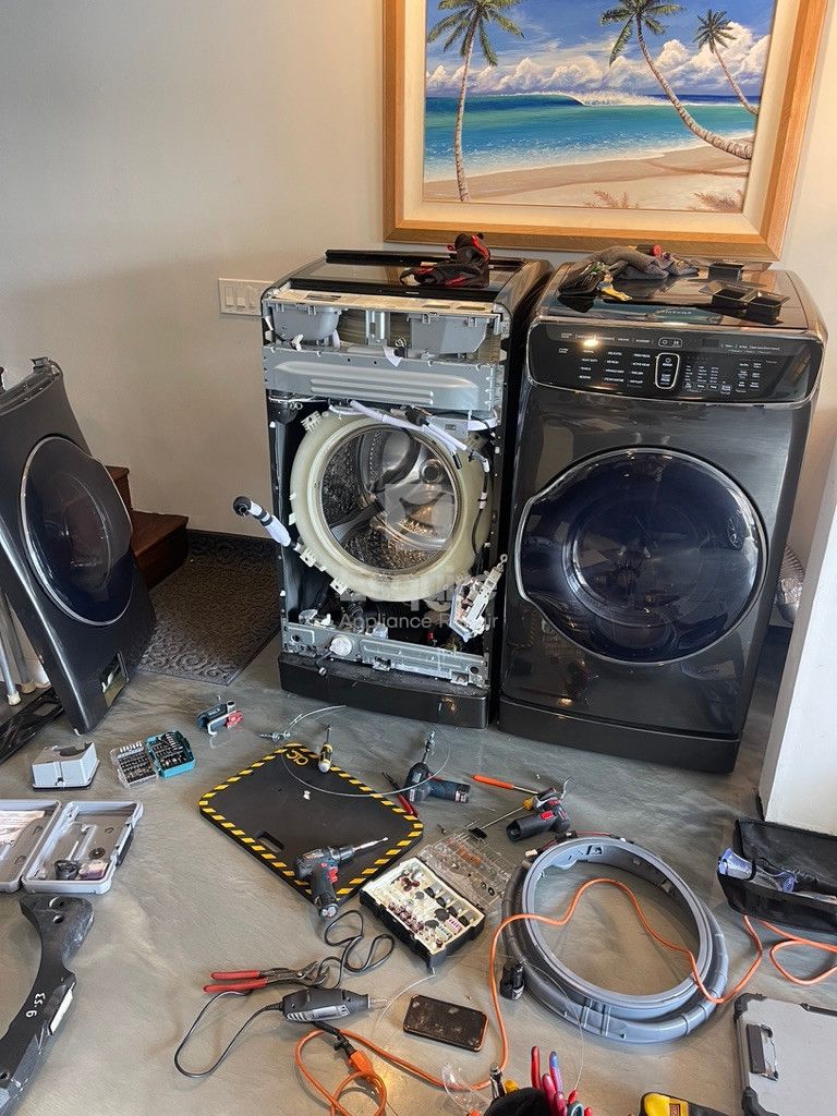 Esquire Appliance Repair technician working on a washer in Orange County